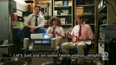 three people sitting in an office with the caption let's just put on some twek videos, alright?