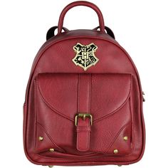 a red leather backpack with an emblem on the front