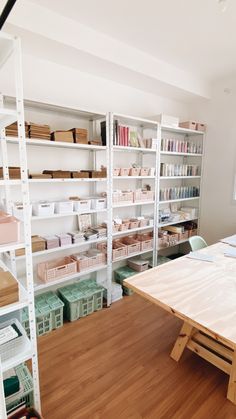 a room with shelving and shelves filled with books