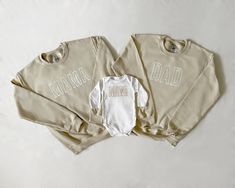 "Each piece is sold separately. These unique embroidered beige and white mama, dad and mini sets for moms and babies and toddlers make for the cutest photos and memories! Each trendy sweatshirt (or bodysuit) is made to order and is perfect for everyday fun as well as baby shower gifting. We also offer custom orders, so feel free to shoot us a message! Our \"mama\" and \"dad\" embroidered sweatshirts come in beige with white lettering and our baby bodysuits and toddler sweatshirts come in white w Mom And Dad Sweaters, Mommy And Me Sweatshirt, Mom And Dad Sweatshirts, Beige Mom, Cute Pregnancy Pictures, Mom Things, Pregnancy Pictures, Matching Mom, Mama Shirts