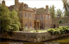 an image of a house that is on the water