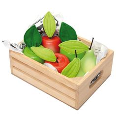 a wooden box filled with apples and vegetables