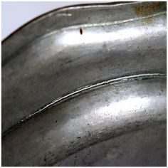 a close up view of the side of a metal object