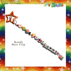 a keychain with the name kandi hair clip written in multicolored letters