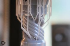 a close up view of the inside of a light fixture with wires attached to it