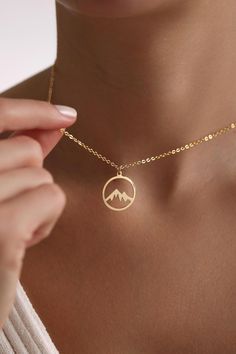 Welcome to the Magical World of PKJewelry Travel Pendant Necklace Gold Plated Dainty Mountain Pendant Necklace is perfect as a special gift for her. This Wanderlust Necklace is a great choice as a gift for Mother's Day, Birthday, Anniversary, Valentines Day, Christmas. Our high quality products are specially prepared for you with great care. The gold plating on it is much thicker than other platings. Therefore, it is a nice gift to be used for a long time. Our products do not tarnish and are ant Mountain Pendant, Wanderlust Necklace, Travel Necklace, Mountain Necklace, Special Gifts For Her, Travel Lover, Coin Necklace, Lovers Gift, Gold Pendant Necklace