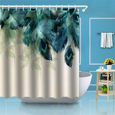 a bathroom with blue walls and a shower curtain that has green feathers on the side