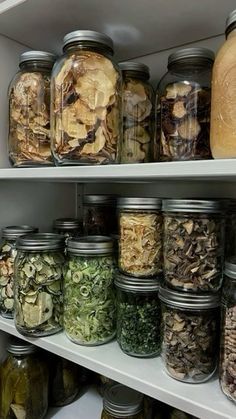 many jars filled with different types of food