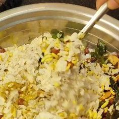 a person is mixing food in a bowl