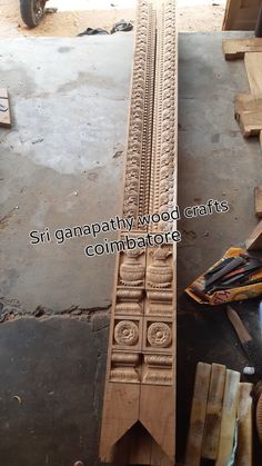 an image of wooden carvings being worked on