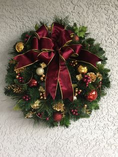 a christmas wreath hanging on the wall