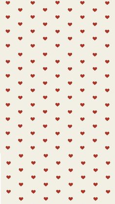 red hearts are arranged in rows on a white background, with small dots all over the surface