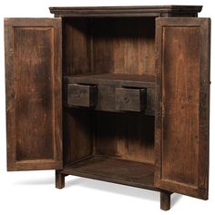 an old wooden cabinet with two drawers