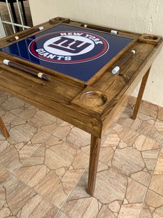 a wooden table with a glass top on it