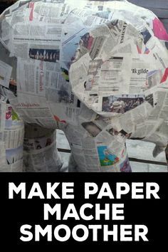 an elephant made out of newspaper paper sitting on top of a wooden bench with the words make paper mache smoother