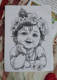 a drawing of a baby with flowers in her hair