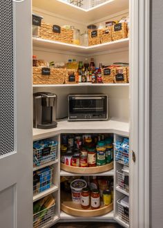 an open pantry with lots of food in it