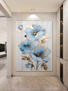 a large painting hanging on the wall in a hallway