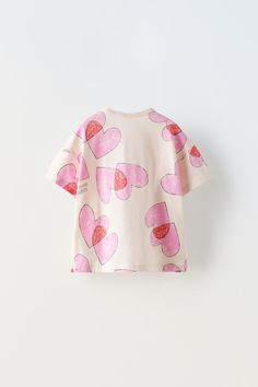 PRINTED T-SHIRT - White | ZARA United States Printed Cotton Half Sleeve T-shirt, Summer Graphic Print Patterned T-shirt, Cotton T-shirt With All Over Print, Casual Patterned T-shirt With Graphic Print, Zara T-shirt With Letter Print And Relaxed Fit, Cute Pink T-shirt With Graphic Print, Pink Cotton T-shirt For Summer, Trendy Printed Crew Neck T-shirt, Multicolor Short Sleeve T-shirt With Screen Print