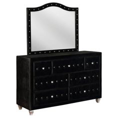 a black dresser with a large mirror on it's top and two drawers underneath