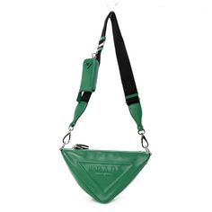 This is an authentic PRADA Grace Lux Triangle Shoulder Bag in Mango. This stylish tote is crafted of green calfskin and features a black nylon shoulder strap with a removable coin purse. The bag zips open to a black nylon jacquard interior. Designer Green Shoulder Bag With Leather Handles, Designer Green Shoulder Bag For On-the-go, Designer Green Shoulder Bag For Everyday, Designer Green Shoulder Bag, Designer Green Shoulder Bag With Adjustable Strap, Green Luxury Shoulder Bag With Zipper Closure, Designer Green Bag With Zipper Closure, Luxury Green Bag With Zipper Closure, Green Leather Shoulder Bag With Zipper Pocket