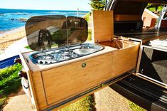 an open trunk in the back of a van