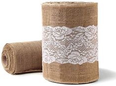 two rolls of burlock with white lace on each side and one roll in the middle