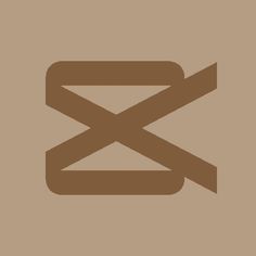 the letter x is made up of two strips of brown paper