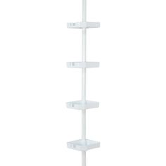 a white corner shelf with three shelves on each side and one in the middle, against a