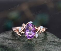 This ring is handmade by myself. The main stone is a 6x8mm oval cut natural  Amethyst,about 1.3ct. The side stones are lab opals. The band width is about 1.4mm. The material is solid 14k gold(white,yellow,rose gold is also available) Ring size can be choose from the selection box. Matching band available: https://www.etsy.com/shop/willwork?section_id=20674906 This jewelry can also be made in solid 10k,14k,18k gold,with real diamonds.Contact me! Need rush order? contact me! Need custom making ord Opal And Amethyst Ring, Fairytale Ring, Couple Ring Design, Amethyst Ring Vintage, Opal Wedding Band, Rose Gold Leaf, Rose Gold Opal Ring, Amethyst Wedding, Nature Inspired Engagement Ring