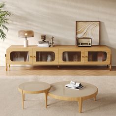 a living room scene with focus on the coffee table and sideboard in the background