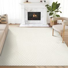 a living room with a white rug and fireplace