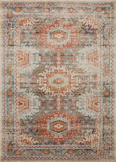 an orange, blue and white rug with ornate designs