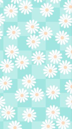 white daisies on blue checkerboard fabric with pink centers and orange centers in the center