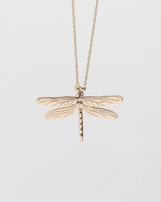 Pacific Northwest Collection The Dragonfly symbolizes change, transformation and adaptability in almost every part of the world. Our Dragonfly Pendant is an exquisite representation in 14k gold, a joyful reminder to seek light and grace in life. Dimensions are a substantial 1 x 1.5 inches, also available in 10k Yellow Gold, 10k & 14k Rose Gold, 10k & 14k White Gold and Sterling Silver. Earrings also available PJM004E Hand-cast to hand-finished in Mt. Vernon, Washington USA Insect Necklace, Silver Dragonfly Necklace, Dragonfly Insect, Mt Vernon, Dragonfly Jewelry, Starfish Pendant, Washington Usa, Dragonfly Necklace, Insect Jewelry