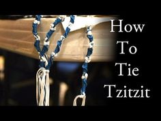 a close up of a blue and white rope with the words how to tie it