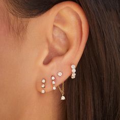 The Jumbo Prong Set Diamond Mini Huggie Earring stands out thanks to the 4 round diamonds per earring, each set with only 3 prongs so you see as much diamond as possible. Available as a single or a classic pair, these huggies can be mixed, matched, and even worn side-by-side as Emily likes to do. Diamond Stud Earrings On Ear Size, Minimalist Ear Piercings, Earrings Diamonds, Diamond Stud Earring, Fancy Jewelry Necklace, Earring Stand, Fancy Jewelry, Hanging Earrings, Diamond Stud