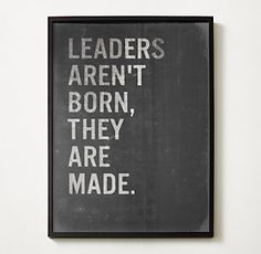 a black and white poster with the words leaders aren't born, they are made