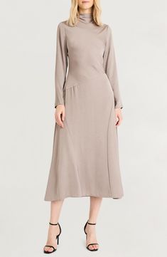 Seamed details bring shape to this long-sleeve midi dress that gently flutters as you move. 51 1/2" length Back zip closure Funnel neck Long sleeves 100% polyester Machine wash, tumble dry Imported Long Sleeve Viscose Maxi Dress For Fall, Elegant Long Sleeve Viscose Maxi Dress, Chic Long Sleeve Viscose Midi Dress, Long Sleeve Viscose Midi Dress For Evening, Evening Long Sleeve Viscose Midi Dress, Evening Viscose Midi Dress With Long Sleeves, Long Sleeve Viscose Midi Dress For Formal Occasions, Formal Long-sleeve Midi Dress In Viscose, Elegant Long Sleeve Maxi Dress With Modesty Panel