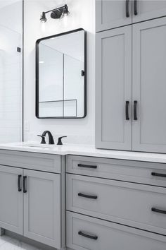 Gary Bathroom Vanity Ideas Gray Bath Vanity, Bathroom Design Gray Vanity, Dark Gray Bathroom Vanity With Black Hardware, Hardware For Gray Bathroom Cabinets, Light Gray Bathroom Vanity Ideas, Grey Cabinets With Black Handles, Black Hardware On Gray Cabinets, Gray Bathroom Cabinets Black Hardware, Grey Bathroom With Bronze Fixtures