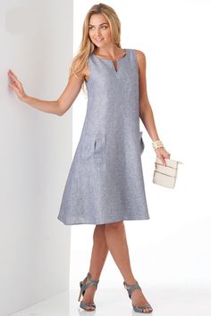 This easy dress pattern featuring trapeze shaped swing dresses can be sleeveless with notched neck and pockets, scoop neck, or scoop neck and shark bite hem. Dress can also have V-neck with half sleeves.New Look 6340   Multi size sewing pattern Includes sizes: 8-10-12-14-16-18-20 Workplace Outfits, Simple Dress Pattern, Shape Dress, Sheath Dresses, Outfit Chic, Trendy Dress, Diy Dress, Western Dresses, Pocket Dress