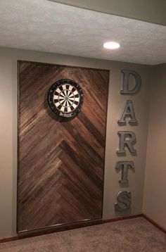 a dart board mounted to the side of a wall