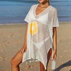 Women Casual Bikini Swimsuit Cover-Up Blouses Beach Tunic Dress One Size K529 Acrylic + cotton blend Imported Hand Wash Only The fabric has some stretch Feature: long sleeve, hollow out, crochet cover up, cover ups for swimwear women Regular fit, swim cover-ups for women, crochet cover-ups for swimwear women, swimsuit cover-up Occasions: suitable for swimwear, beach, swimming pool, summer party, and vacation Please refer to the last image for the size chart (The size chart is clothes size, NOT h Summer V-neck Swimming Cover-up, Fitted V-neck Beach Cover-up, V-neck Stretch Swimwear For Beach, Stretch V-neck Swimwear For The Beach, Stretch V-neck Swim Dress For Vacation, Beachy Short Sleeve Poolside Cover-up, Summer V-neck Beach Cover-up Swimwear, Stretch V-neck Beach Dress For Vacation, Fitted V-neck Swimwear For Beach Cover-up