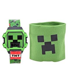 a green minecraft watch and wristband with an image of a creepy face on it