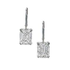 A pair of drop earrings containing 10.01 carats of GIA certified emerald cut diamonds, set in platinum. Ear Piercings Industrial, Diamonds Direct, Emerald Cut Diamond, Diamond Drops, Emerald Cut Diamonds, Diamond Drop Earrings, Emerald Diamond, High Jewelry, Emerald Cut