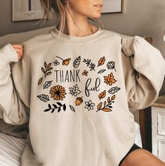 "Cottagecore Fall Sweatshirt, Vintage Thanksgiving Sweatshirt, Pumpkin Shirt, Autumn Crewneck Shop with Confidence! We are a 5-Star Rated Shop operating since 2015! HOW TO ORDER MULTIPLES: 1. Select your size and color in the drop down menus. 2. Click Add to Cart, then go back and repeat for each shirt. SIZING: * All sweatshirts are unisex, classic fit. Please refer to size chart in listing photos for details. * Easy measuring tip: Take your favorite shirt, lay it on a flat surface and measure t Vintage Sweatshirt With Screen Print For Fall, Trendy Fall Graphic Sweatshirt, Trendy Fall Crew Neck T-shirt, Fall Sweatshirt Ideas, Retro Oversized Fall Sweatshirt, Fall Cottagecore Crew Neck Sweatshirt, Thanksgiving Crewneck, Fall Shirts For Women, Fall Crewneck Sweatshirt