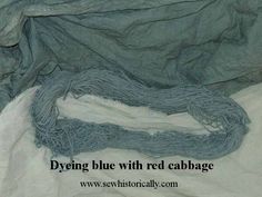 an image of blue fabric with the words dyeing blue with red cabbage