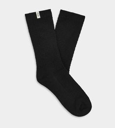 Made from a lightweight Merino blend, this breathable sock is designed to wick moisture, enhancing the wearing experience of our sheepskin boots. | Perfect crew sock to wear with your favorite UGG® Sheepskin boot. Merino Wool Blend - 51% Nylon/25% Polyester/15% Acrylic/8% Wool/1% Elastane. 9 1/2 inch height. Soft twill tape with The UGG® Logo on top cuff. Fits shoe size: 5-10. Imported. | UGG® Women's Classic Boot Sock II Sheepskin Socks in Black Black Warm Socks, Black Fall Outdoor Socks, Black Outdoor Socks For Fall, Comfortable Midweight Black Socks, Comfortable Black Cushioned Socks, Comfortable Black Socks, Swimsuit Jewelry, Ugg Accessories, Cozy Socks