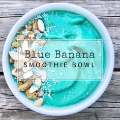 blue banana smoothie bowl with almonds on top and the words, blue banana smoothie bowl