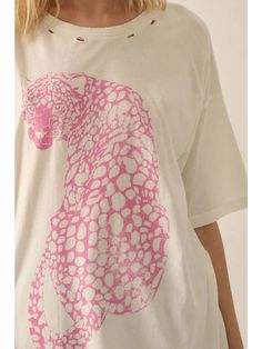 Color: Ivory Vintage-Style Cheetah Graphic Print in Pink Distressed, Garment Washed Round Neckline Short Sleeves Dropped Shoulder Torn And Distressed Detailing At Neckline, Cuffs, And Hem Oversized Fit 100% Cotton Model: Height- 5'9"/ Bust- 31in / Waist- 23in / Hips- 33in and is wearing a SMALL Graffic T Shirt, Grafic Tees Print, Unique Graphic Tees, Oversized Graphic Tee Outfits, Preppy T Shirts, Graphic Tees Aesthetic, Cheetah Graphic, Butterfly Graphic Tee, Leopard Graphic